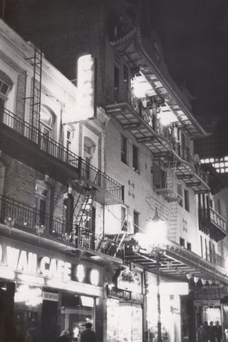 Black and white vintage photo of a street in Chinatown NYC