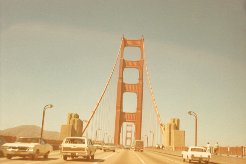 Warm-tinted vintage photograph of the Golden Gate bridge in San Francisco
