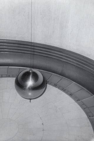 Black and white vintage photo of the Foucault Pendulum from Los Angeles' Griffith Observatory 