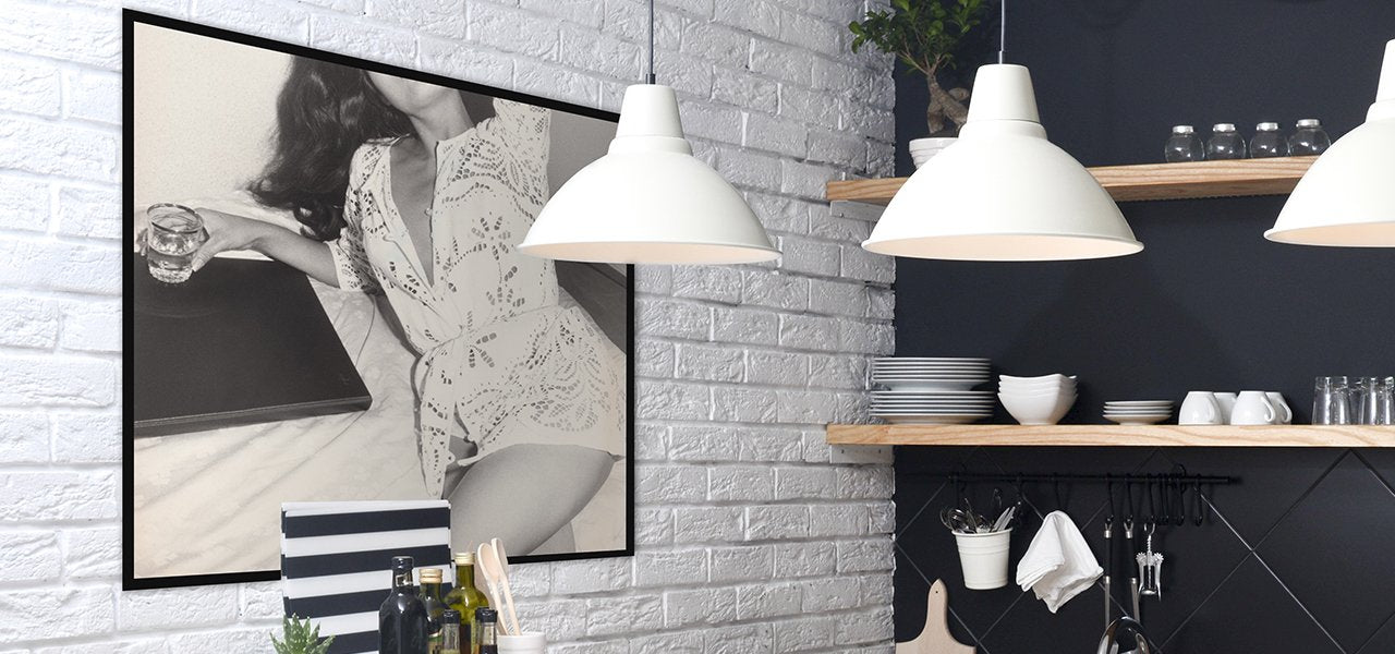 Modern kitchen with a vintage black and white photograph of a beautiful woman